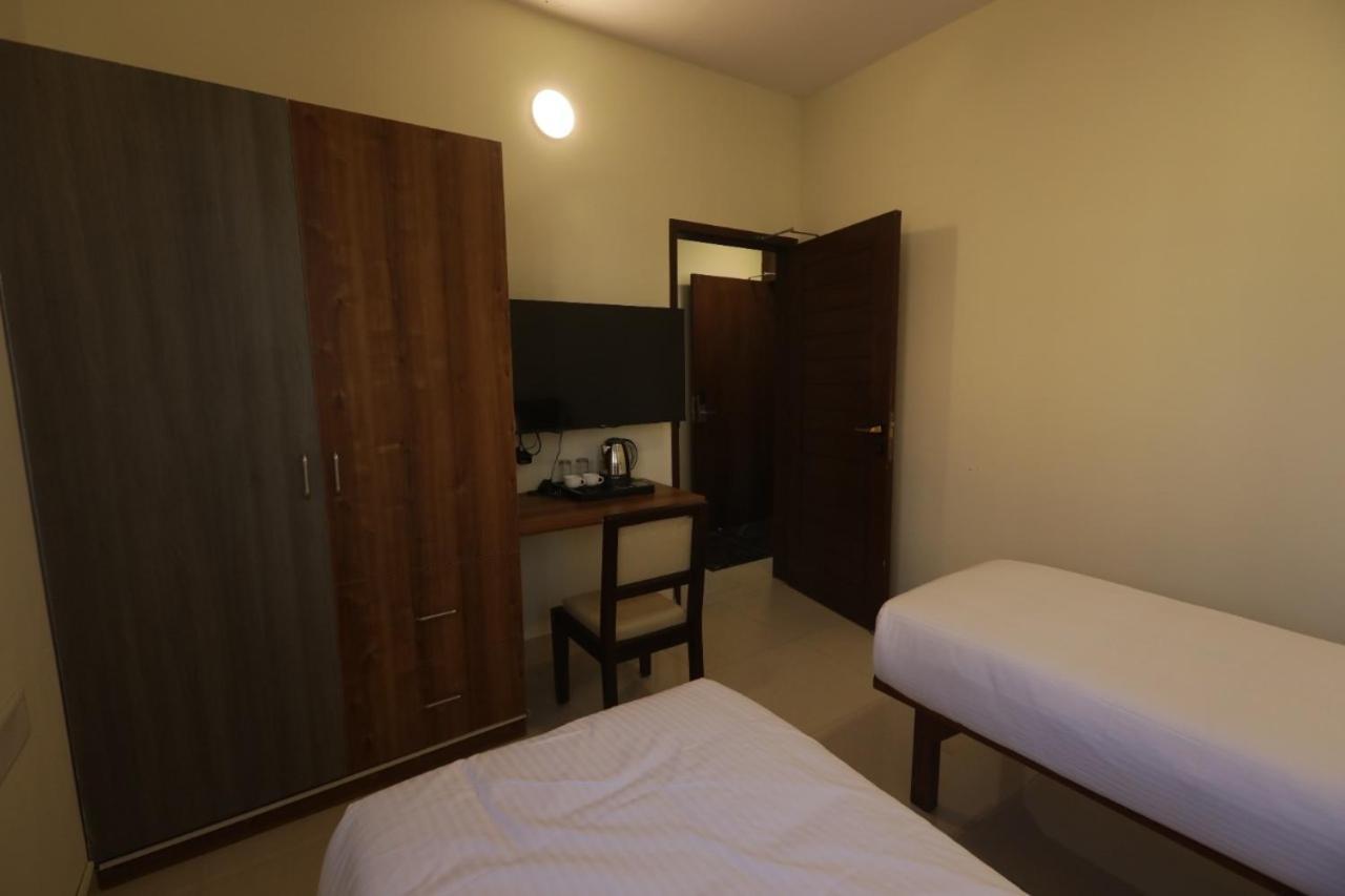 Elysian Grand Hotel Bangalore Extérieur photo